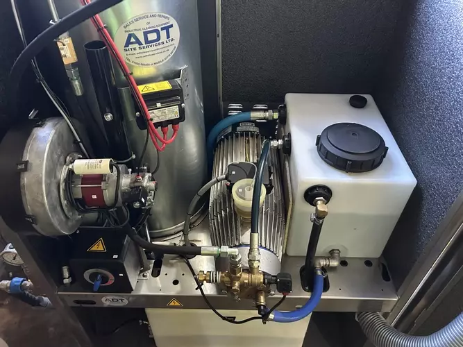 Industrial diesel hot pressure washer reassembled and operational after emergency boiler coil replacement in Atherstone.